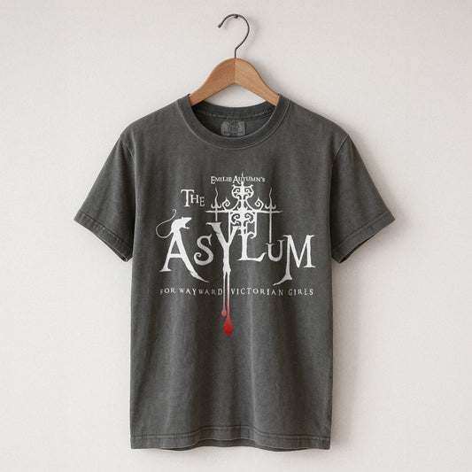 Pepper Comfort Colors t-shirt with 'The Asylum' graphic design on a hanger against a white background
