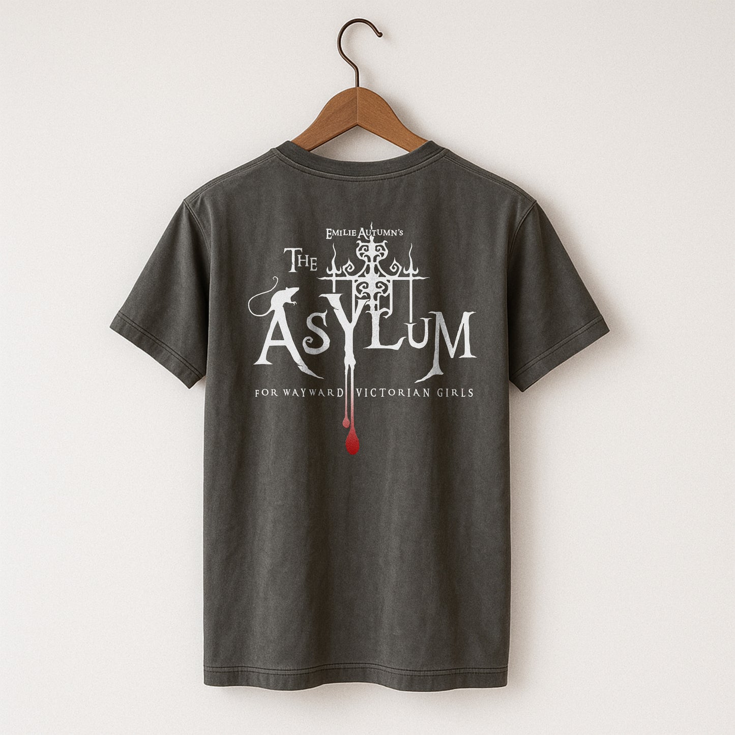 Pepper Comfort Colors  t-shirt with 'The Asylum' design on a hanger against a white background