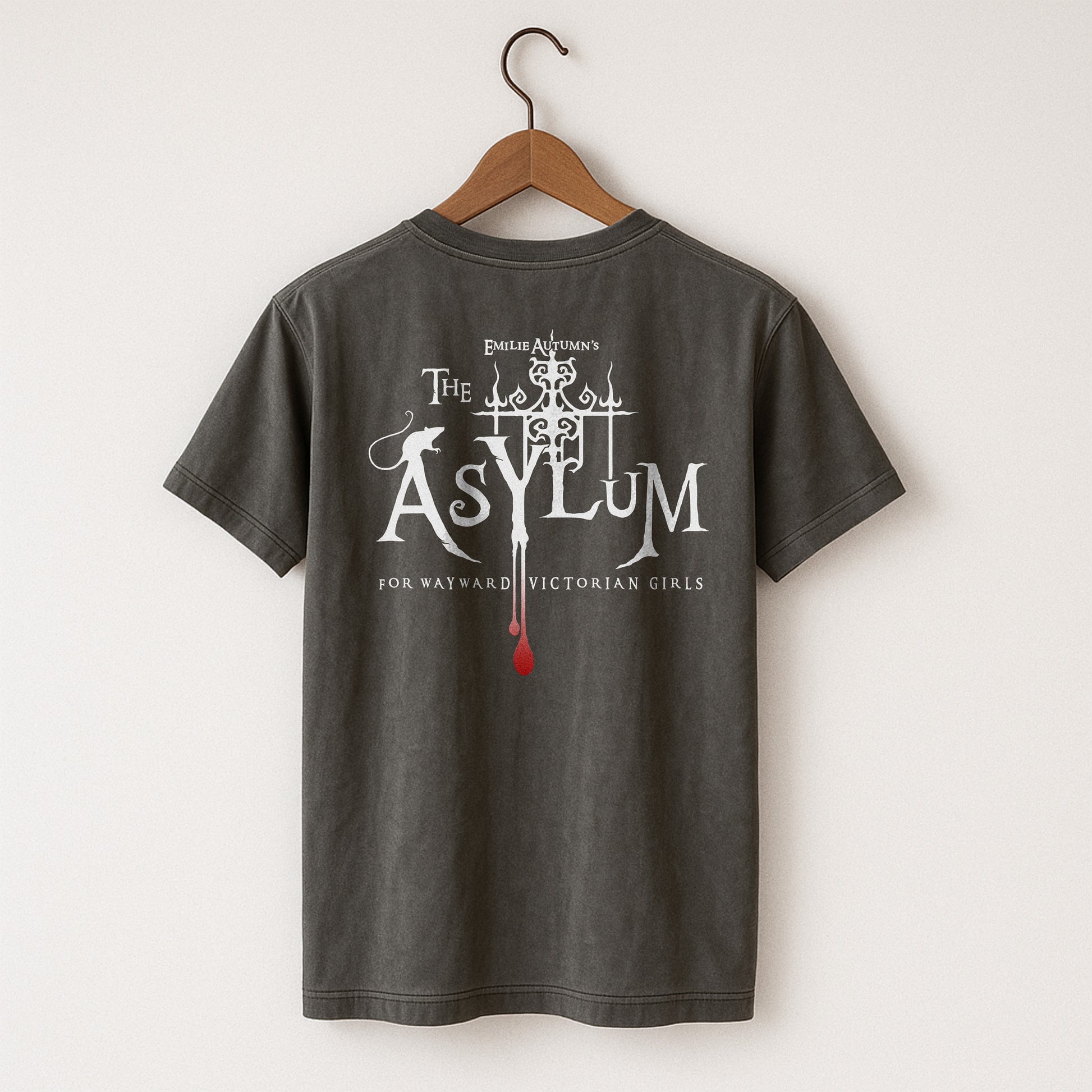 Pepper Comfort Colors  t-shirt with 'The Asylum' design on a hanger against a white background
